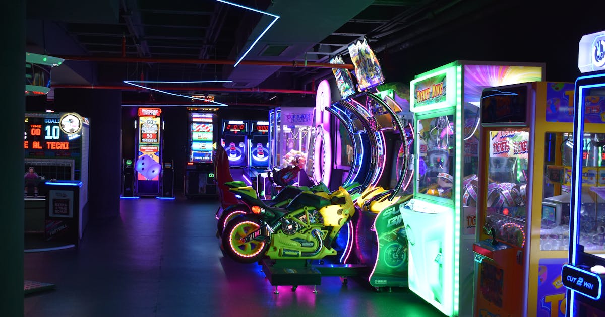 Lively family arcade and entertainment centre with colourful neon lights and gaming machines