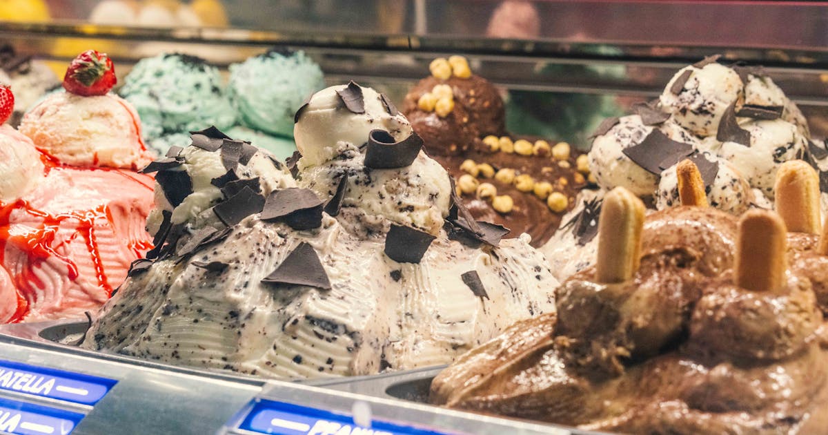 Vibrant artisan gelato display with colourful creamy flavours in a modern dessert bar